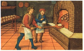 Medieval baker putting bread into oven